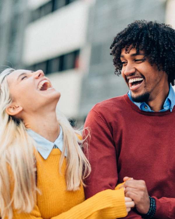 A couple pictured smiling and feeling happy and health in body and mind